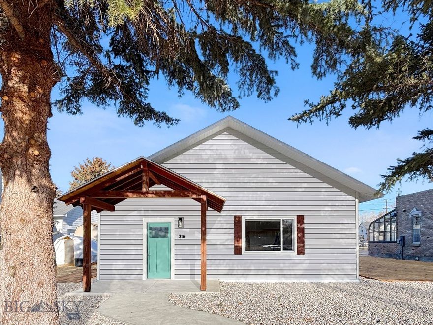 Welcome to this charming brand-new build at 315 S. Railroad in Dillon, Montana, offering thoughtful design, efficient living, and some of the cutest curb appeal on the street! Mature pine trees and a welcoming covered front porch set the tone for this inviting home before you even step inside through the Smart Glass Door.
Though 1,178 square feet, the home feels impressively spacious thanks to 10-foot ceilings, bright natural light, and a smart, efficient floor plan. The front entry leads you directly into the heart of the home where clean finishes and quality craftsmanship shine. Featuring quartz countertops red oak trim throughout, as well as an upgraded refrigerator, creating a stylish and functional space for everyday living and entertaining.
The open living area offers comfortable gathering space with views of the surrounding mountains, bringing the beauty of Southwest Montana right into your home.
The spacious primary suite includes a walk-in closet and a private bathroom with a tiled shower. Across the hall you’ll find two guest bedrooms and a full guest bathroom with a tiled tub, providing a practical layout for guests, family, or office space. Additional highlights include a high-efficiency furnace, extra off-street parking in the rear, and room to build a garage if desired, with build-to-suit garage options available.
The property is partially landscaped with river rock and edging, leaving the remaining yard areas ready for sod or your choice of landscaping to make it your own.
Located close to all of Dillon’s amenities and downtown, this home also offers a fun Montana bonus — Blacktail Deer Creek flows right across the street, making it easy to drop a line and enjoy a little fishing just steps from your front door!
This brand-new home combines modern finishes, efficient design, mountain views, and a great Dillon location—all wrapped into an inviting and manageable package.