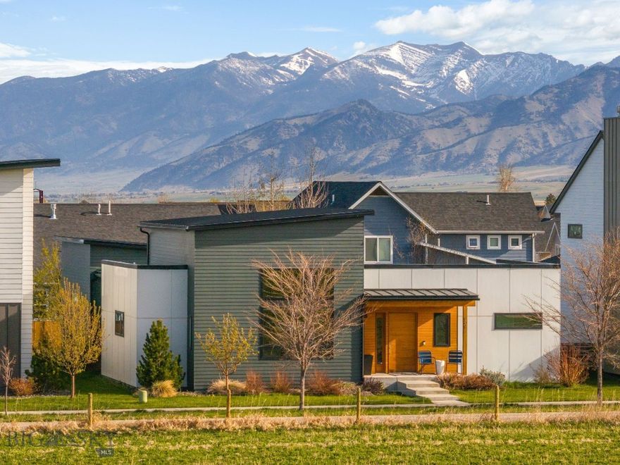 Single level southside living with views that cannot be beat. This lightly lived in, clean and contemporary 3 bedroom, 2 bathroom home stuns with vaulted ceilings, modern finishes, and a thoughtful layout. With abundant natural light and unobstructed southern views, the open-plan kitchen/living/dining area is impressive for hosting, but functions equally as well for a cozy night on the couch. If you're a cook, you'll enjoy the upgraded appliance package and ample counter and storage space. (..And if you're a houseplant, you will be exceedingly happy with all the sunshine)
The master suite features a sizable walk in closet and a beautifully tiled extra large shower. On the other end of the house you will find two additional bedrooms and a smartly planned full bath.

This property has a goldilocks sized backyard, so you can enjoy your summer without feeling like you're married to your lawn mower. Grilling and yard games and hot tubbing without leaving the comfort of your home are within your grasp! 

Don't miss this luxury meets low maintenance primetime location Bozeman home!