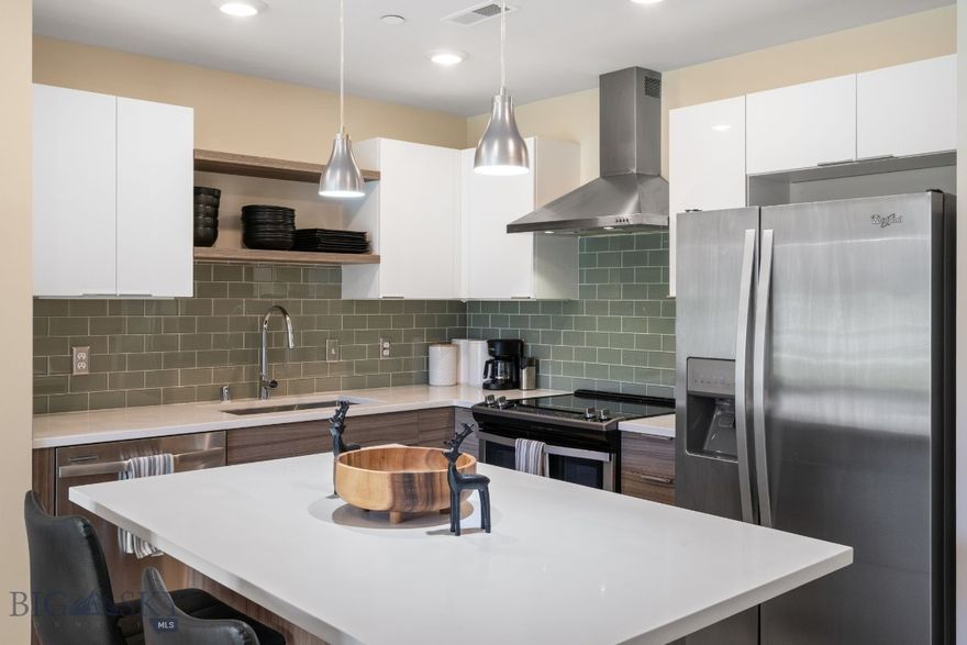 Premier location in South Bozeman, this ground-floor, south-facing 1-bedroom, 1-bath unit offers an effortless lock + leave lifestyle just a short walk from MSU's campus. Built in 2017, the 648 sq ft unit features contemporary finishes throughout with quartz counters, full tile backsplash, stainless steel appliances, Euro-style windows, and a walk-in shower. In-unit washer/dryer, a large bedroom closet, A/C, and LED lighting round out a thoughtfully appointed space. Building amenities include two fitness rooms, elevator, secure entry, and an assigned covered parking space. HOA covers exterior maintenance, water, sewer, trash, and lawn care. Units can be used as rentals, making this an equally compelling option for investors seeking proximity to MSU and Bozeman's growing south side corridor.