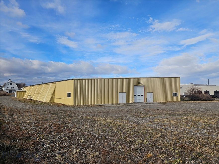 This ±22,000 SF warehouse with office and yard space, situated on 3.99 acres, is available for lease. Located just off of Huffine Lane (Highway 191) the property is serviced by a well, a substantial septic system, natural gas, compressed air, and 1200 AMPs of three-phase power. Originally built in 1985, added onto in 1998, the steel building is ready for a new tenants. The property is presently configured for a single user but has plans to be demised for qualified tenants into 3 units. Estimates are 6,600, 4,200, and 11,300 SF in size. This property is centrally located just West of Bozeman, 15 miles from Interstate 90 and a 30 minute drive to Big Sky. The property is suitable for large trucks/semis with multiple points of access, equipment storage and laydown yard. The offering is well suited for manufacturing, shipping and receiving, warehousing, distribution operations, along with other industrial and commercial uses.