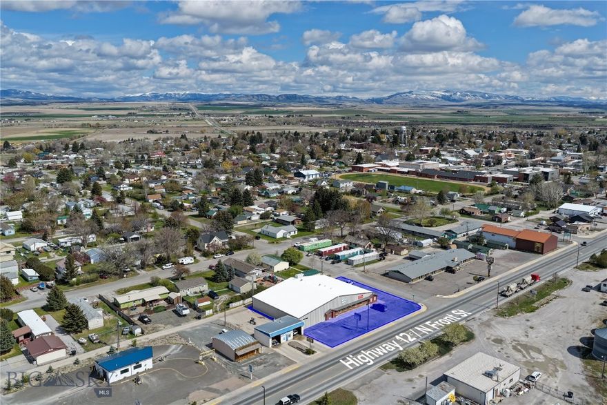 Highway 12 exposure is hard to beat. 500 N Front Street in Townsend offers 12,426 sqft of commercial space on .489 acres inside city limits, with over 20 parking spaces and multiple established businesses already in place. The building is home to Kickstart Nutrition, V42 Fitness, a massage space, and wrestling space used by Townsend Bulldogs Wrestling and youth programs, with room to expand. Inside are men’s and women’s ADA locker rooms with toilets, showers, sinks, and changing areas that connect to both the gym and wrestling side. The wrestling area also includes a private office, bathroom, storage closet, and open mat space. Upstairs has a shared laundry room, utility room, and owner storage. Built in 2012 with AC and a solid HVAC system, all set up in a high-traffic location. Come take a look!
