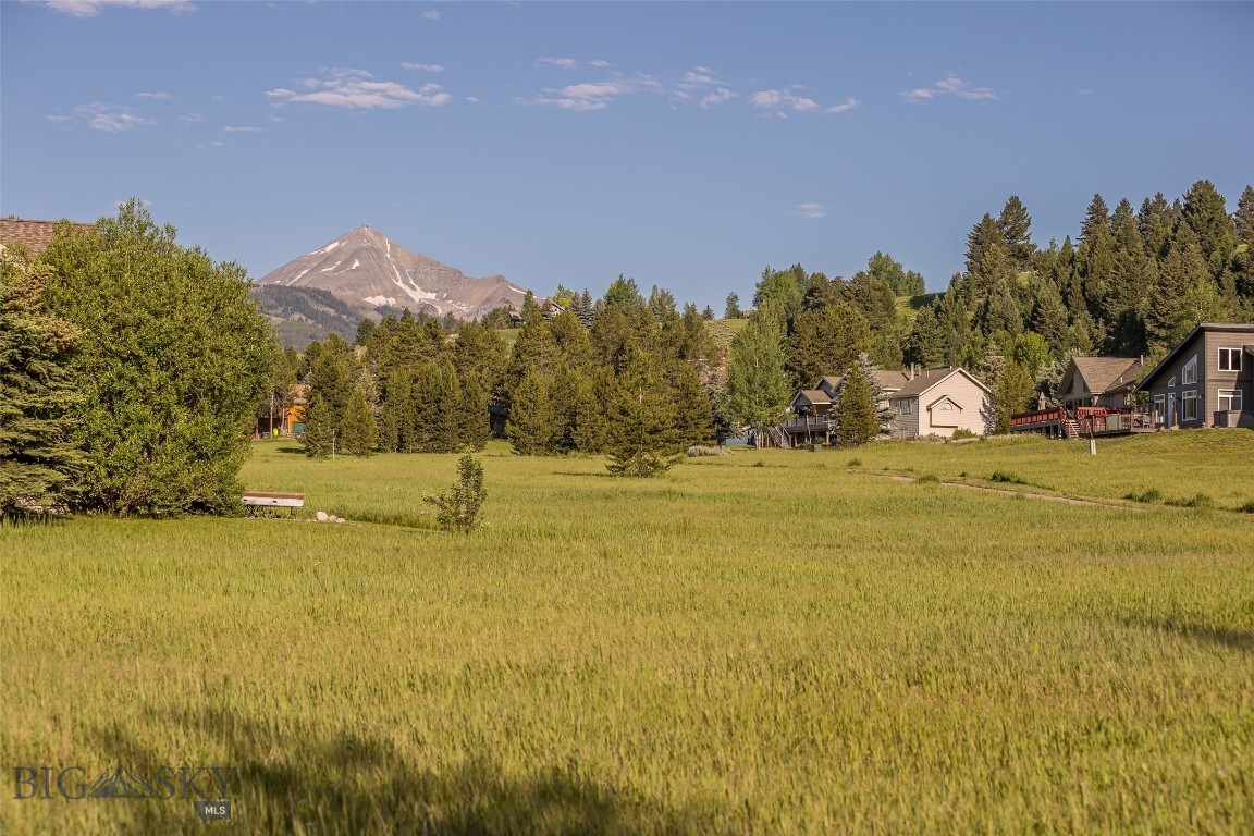 Discover a rare opportunity to build in the heart of Big Sky’s Meadow Village. Lot 1 on Spotted Elk Road—a spacious and level .275-acre parcel—sits in a peaceful cul-de-sac and offers stunning views of Lone Mountain and the surrounding landscape.
Tucked into a well-established community, this lot backs to dedicated open space, ensuring both privacy and a serene natural setting. Just steps away, the Big Sky Community Trail System provides direct access to scenic walking, biking, and Nordic ski trails. Community tennis and pickleball courts are conveniently located just across the street.
Enjoy the best of both worlds—quiet mountain living with close proximity to the vibrant Town Center and Meadow Village, where shopping, dining, and recreation are just minutes away. A rare find in a prime location, this property is ready for your Montana dream home.