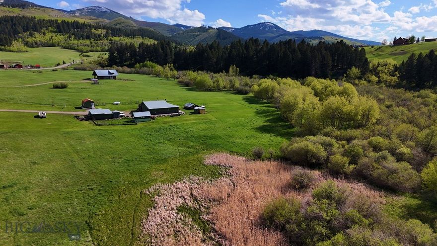 13.5 acres Located near Bozeman Montana in Gallatin Gateway. Bring your horses, start a hobby farm, Airbnb for income, or build your dream home. The property backs to nearly 15 Acres of OPEN SAPCE with Little Bear Creek running through. Property Includes a Duplex with two studio units (each with a kitchen and bathroom), garage, and a RV Pad with full hookups- water, sewer, electric to site. Also features two Greenhouses, two sheds, abundant wildlife, and a natural spring. A few miles up the road, there is forest service access to Custer Gallatin National Forest. It is well positioned, being 31 miles from Big Sky and 17 miles from Bozeman.