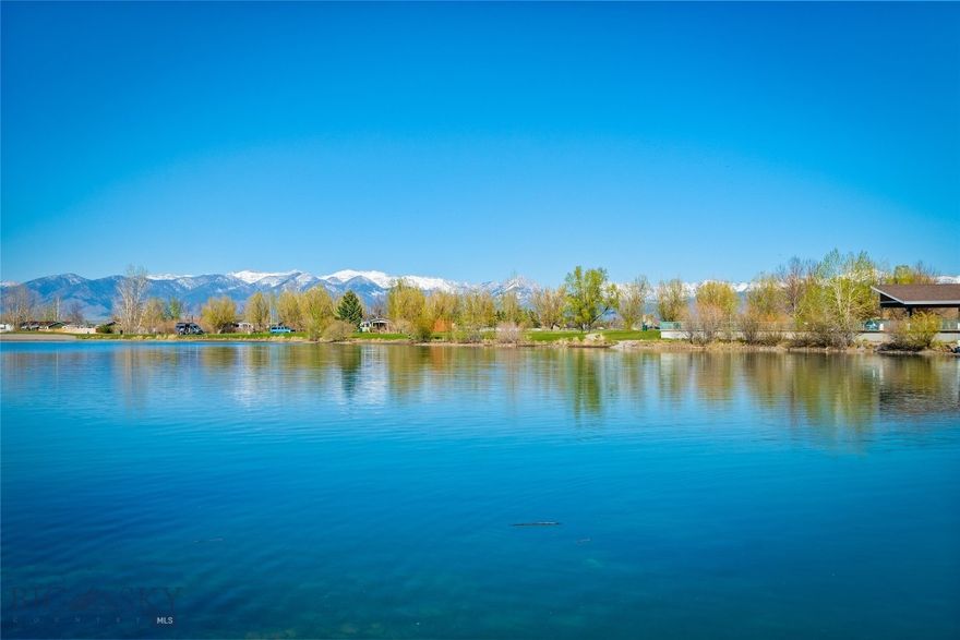 Have You Dreamed Of Living On Waterfront Property For An Affordable Price? 
This Is The Perfect Lock & Leave Property For You!
Live Right on River Rock Pond in this Beautifully Updated Top-Floor Condo Offering Comfort, Convenience & Stunning Montana Scenery. Welcome to 129 Village Drive, Suite 301B, a Light-Filled 1-Bedroom, 1-Bath Residence with Exceptional Views of River Rock Pond & the Bridger Mountain Range from the Bedroom, Main Living Area & Private Balcony. Whether Enjoying Morning Coffee or Unwinding at the End of the Day, the Peaceful Waterfront Setting & Expansive Views Create a Truly Special Backdrop.
This 760+/-sq ft Condo Has Been Thoughtfully Refreshed with New Flooring, Fresh Interior Paint & Added Bedroom Cabinetry for Enhanced Storage & Function. North-Facing Windows Provide a Plethora of Natural Light, Creating a Clean & Airy Atmosphere Throughout. The Floor Plan is Both Comfortable & Efficient, With Convenient In-Unit Laundry, Forced Air Heat, & Central Air for Year-Round Ease.
Significant Exterior Improvements Include New Siding & Roof. The Commercial-Sized Elevator Makes Access to this Third-Floor Unit Simple & Convenient. Pets & Rentals are Allowed, Adding Flexibility for Both Owner-Occupants & Investors. 
The HOA is Professionally Managed & Dues Help Simplify Ownership by Covering Water, Sewer, Utilities, Garbage, Lawn Care, Snow Removal & Master Insurance. Ample Open Parking is Available for Residents & Guests a like. River Rock Residents Also Enjoy Walking Trails, the Scenic Pond Environment & Close Proximity to Local Amenities Including Bozeman Yellowstone International Airport.
Full-Time Residence? Easy Lock-And-Leave Second Home? Investment Property? With So Many Possibilities, This Move-In-Ready Condo Offers the Perfect Blend of Waterfront Living, Mountain Views & Convenient Access to Everything Belgrade & Bozeman Have to Offer.