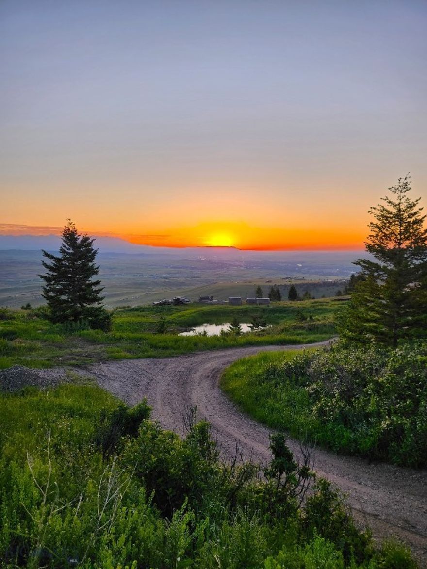 Mountain views in all directions! This 30-ac parcel is situated with unmatched expansive views of the surrounding mountains and valley. End-of-the-road privacy. The spring-fed pond attracts tons of wildlife including Elk and Deer. The infrastructure includes 2 positive pressure wells drilled & producing. One well is near the proposed 44x84 barn with leveled and compacted gravel,10x10 posts and 4" exterior drain tile. Another well is for the home site that has a 24x48 house foundation sealed insulated and backfilled. Building materials on site including * approximately 10,000 board feet of rough sawn lumber 8x8's 8x10's 10x10's 20 foot average length including miscellaneous 2x and 1x material. Also a pallet of 37 - 4 foot by 8 foot dbl pane high tempered glass. There is an approved soil test and sanitary plan for a 5-bedroom residence and an oversized 5000 gal septic tank. The drain field will need to be completed. There is a 320-amp electrical service with 2 -100 amp 240 volt remote pedestals installed near 2 graveled camp sights. There is 1/2 mile of new road built to access the 20 acres of beautiful mature white fir forest with additional cabin and camp sights along the way. Also great for recreation and exploring on horseback. Enjoy nearby Yellowstone Park, an hour drive, Blue Ribbon fishing on Yellowstone River, skiing, hiking, and more.