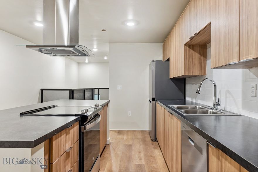 Experience modern living in historic Uptown Butte at Rudolph Condos, Butte's newest condominium development. This 2-bedroom, 2.5-bathroom split-level condo features an open floor plan and a private covered patio for outdoor enjoyment. The stylish kitchen boasts stainless steel appliances, while the spacious living area is perfect for entertaining. Downstairs, two ensuite bedrooms offer comfort and privacy. Located in the heart of Uptown Butte, you’ll enjoy easy access to dining, shopping, and local attractions. Don’t miss this rare opportunity to own a contemporary condo in a vibrant, historic setting!