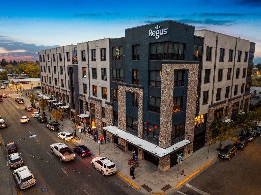 Experience elevated downtown living in this stunning 3-bedroom, 3-bath penthouse at 5 W Mendenhall Street, Unit 510. Situated in one of Bozeman’s most desirable luxury buildings, this top-floor residence offers nearly 2,500 square feet of refined living space paired with breathtaking views of the surrounding mountains. This meticulously designed home features an expansive open floor plan with floor-to-ceiling windows that flood the space with natural light and showcase panoramic vistas of the Bridger Range.
The gourmet kitchen is outfitted with top-of-the-line appliances, sleek cabinetry, a generous island, and high-end finishes—perfect for entertaining or enjoying a quiet night in. The addition of a butlers pantry provides extra storage and prep space with wine storage and refrigeration. The spacious living and dining areas offer an inviting space for relaxing or gathering creating a cozy retreat in the heart of the city. Residents also enjoy access to a shared rooftop space—an ideal setting to take in Bozeman’s fresh air and stunning scenery.
The primary suite is a true sanctuary, featuring large windows, dual vanities, a walk-in tile shower, and an oversized walk-in closet. Two additional bedrooms and bathrooms ensure comfort and privacy for guests or flexible use as office, fitness, or creative space. Additional highlights include engineered hardwood flooring throughout the main living areas, central A/C, custom lighting, and a full-size laundry room with ample storage.
This penthouse also includes two reserved parking spaces in the secure, heated garage—a rare and valuable amenity in downtown Bozeman. Located just one block from Main Street, you’ll enjoy effortless access to some of the city’s best dining, shopping, entertainment, and community events. Whether you're taking in a show at the Emerson, strolling the farmers’ market, or heading out to nearby trails, this home puts you in the center of it all.
Don’t miss this rare opportunity to own a luxury penthouse in one of Bozeman’s premier addresses. Live the vibrant downtown lifestyle with all the comfort, space, and sophistication of a private retreat.