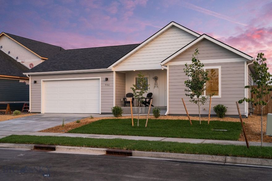 Welcome to the NEW Williams Homes in West Post! Now including 9' ceilings, fencing, AC, a tiled primary shower, pearl white kitchen backsplash, white cabinets, modern fixtures and black hardware, a finished garage, and more. Heading into this charming single-level home, only one step takes you onto the covered front porch before entering. You'll find vaulted ceilings in the living room and primary bedroom to create the perfect amount of space and lighting. Access to the backyard can be found through the 6' living room glass slider, which leads you to a generous covered patio, perfect for summer BBQ’s and outdoor lounge space. An oversized, deep garage with room for full-sized trucks also provides outside access to the patio and inside access through the mudroom. Thoughtful touches like soft-close cabinets, MOEN fixtures, luxury vinyl plank floors, and GE appliances are found throughout. 

With quick access to I-90 and the Yellowstone International Airport, this new neighborhood is conveniently located between Belgrade, Four Corners, and Bozeman. Easily access your favorite restaurants, grocery stores, and more. Walking paths connect residents to the central neighborhood park, which features playgrounds, sports fields, a dog park, picnic areas, and a pond for recreation. Please meet at our model home at 700 Thrice Loop for all tours.