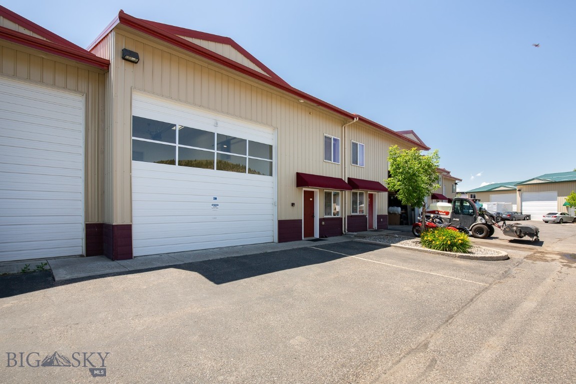 Fabulous opportunity to own a multi-use commercial condo with warehouse and office space in the conveniently located East End Commercial Warehouse complex. M1 zoning, close to downtown, easy access to I-90, great floorplan, extremely well maintained. The main level includes a large garage/warehouse/shop space with overhead door and tall ceilings, office space, kitchen area and 3/4 bathroom. Upstairs you will find two more large, private offices and an open area that can be setup however you see fit. This unit is extremely functional and well designed for many uses. Call today to schedule a showing!