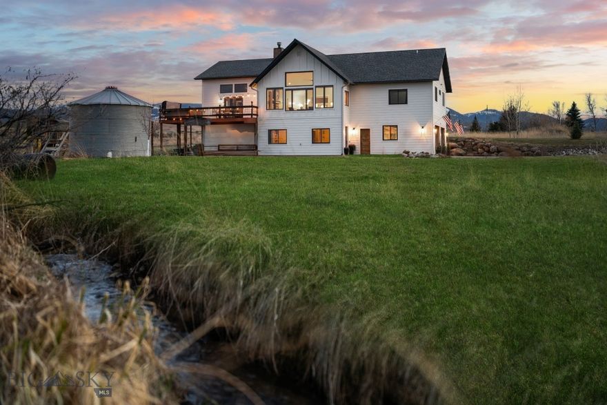 Welcome to  236 Holland Lane in Bozeman, Montana!  A truly exceptional property that offers the perfect blend of country charm and modern convenience. This stunning home is ideally situated on just under 2 acres, providing a peaceful retreat with breathtaking, unobstructed views of the Bridger and Gallatin Mountain ranges.

Located in a highly desirable area, this property is conveniently located 13 miles from Downtown Bozeman, 15 miles from Bozeman Yellowstone International Airport, and 32 miles from Big Sky.

The home itself boasts 4 spacious bedrooms, a versatile den, and 3 full bathrooms, offering ample room to grow and relax. You can enjoy cozy evenings by one of three fireplaces or step outside onto the half wrap-around deck to take in the serene views of the surrounding mountains and farmland. Wortman Creek meanders through the property, adding to the peaceful ambiance. Additionally, light covenants provide flexibility for your lifestyle, including the option for horses and farm animals.

A significant highlight of this property is the approved permit for a 2-bedroom Accessory Dwelling Unit (ADU) and septic system expansion. This offers fantastic potential for future rental income or a guest house, which could even include shop space.

This home truly delivers the best of Montana living – privacy, incredible views, versatility, and convenience. The seller is also offering a negotiable paint and flooring allowance, providing immediate equity.

Don't miss this rare opportunity to own a slice of paradise in one of the valley's most sought-after locations!