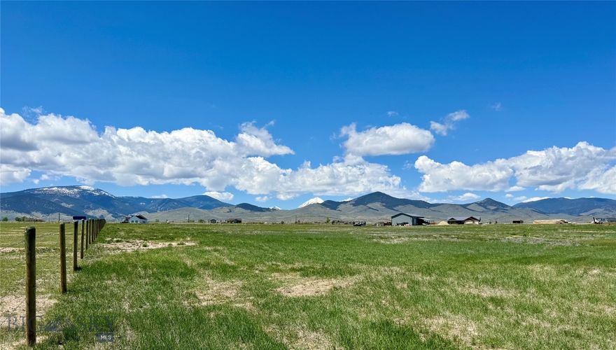 Homesite supreme on this 5.01+/- lot with spectacular views of the Beaverhead Valley's surrounding mountains. Only 10 minutes to Dillon and a few minutes to year round outdoor recreation including hiking to lakes in the Pioneer Mountains, fishing or camping. The two area's premier fisheries, the Beaverhead and Big Hole Rivers are nearby and a myriad of other areas to explore in close proximity. The lot is level with DEQ Septic approval already in place. Come have a look and imagine your new home!