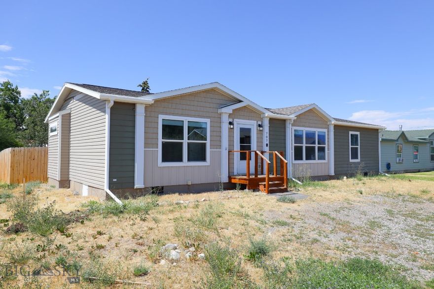 SELLER OFFERING $10,000 CREDIT FOR CLOSING COSTS, REPAIRS, RATE BUYDOWNS!
Come and see one of Belgrades most affordable options for a 3 bed 2 bathroom single family home! This cozy de-titled manufactured home features modern finishes, a fenced in back yard, no HOA and Central AC!

Step inside and you are greeted with an open floorplan with a large living room space and ample kitchen/dining room space suitable for your hosting and living needs. Continue pass the living room you will find 2 roomy bedrooms with walk in closet space and a full bathroom. 

On the opposite side of the house y-ou will find the primary bedroom with vaulted ceilings and walk in closet. Giving you a perfect space of solitude from the rest of the house. The generously sized en-suite bathroom features dual sinks, soaker tub and walk in shower giving you a perfect place to unwind and relax after a long days work or a well needed restful weekend.

Step outside the sliding glass door in the dining room area and you'll find a good sized back yard. Whether you are looking to start your next garden or landscaping project, host friends and/or family, letting your pets run free, or a place to build a shop, this back yard space is a perfect place for future projects to come.

Other features include a gas range, Ring doorbell and security system, outside storage shed, and an on-demand hot water heater. also located close to downtown Belgrade, Belgrade schools, Bozeman Airport, Bridger Bowl Ski Resort, Big Sky Ski Resort and a couple hour drive from Yellowstone National Park. Check out this wonderful opportunity to have your own 4 walls at an affordable price! Check out the 3D tour!