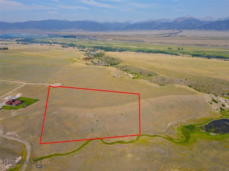 Vacant Lot 127 in Pronghorn Meadows – 4.69 Acres Discover your dream home site with this stunning 4.69-acre parcel located at the end of Browtine Lane in Ennis, MT. Positioned in an elevated spot, Lot 127 offers breathtaking views overlooking Eightmile Creek, the expansive Madison Valley, and the majestic snow-capped peaks of the Madison Range Mountains. Enjoy the tranquility of an end-of-the-road location while being just 3.5 miles from the charming town of Ennis and a mere half-mile from the paved highway. This property provides easy access to world-renowned fishing spots on the Madison River and the vast open spaces of public lands surrounding the Madison Valley. This pristine parcel is ready for you to build your dream home in the heart of the Rocky Mountains. Embrace the Montana lifestyle with unparalleled natural beauty and endless outdoor adventures at your doorstep.