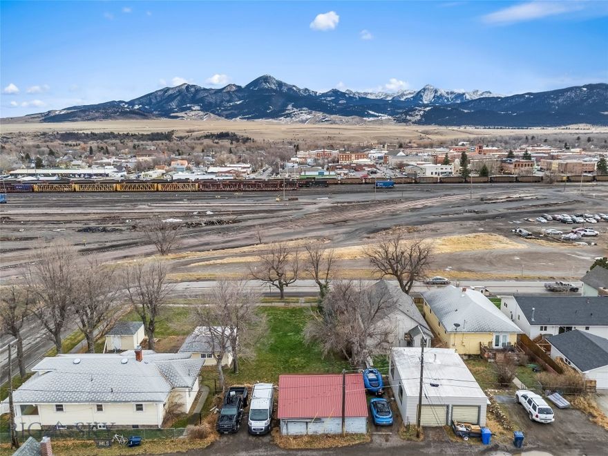Unlock your Montana Dream in Livingston, Montana!  Two vacant lots totaling 7000 sq ft await your vision, complete with an existing garage and wonderful mountain views.  These lots are a blank canvas to build your dream home or investment property.  Room for expansion is possible with the CIRCA 1923 2 bedroom, 1 bath home on a 10,500 sq ft lot next door available as well (see MLS#407563).  
Located in one of Montana’s most sought after towns, you’ll enjoy easy access to downtown with its local shops, dining and vibrant culture.  Just minutes away, experience world-class fly fishing on the Yellowstone River, hiking, skiing and endless outdoor recreation- all while taking in the sweeping Big Sky views that make Montana the Last Best Place.  Whether you’re looking to build, invest or just embrace the Montana lifestyle, call your realtor to take a look!