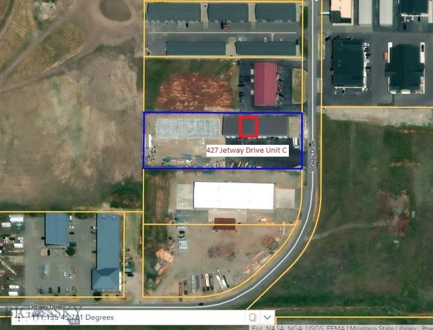 Prime opportunity to own your own 3,000 sq/ft shop in the Gallatin Valley. This property is located in the East Gallatin Commercial Center, close to BZN airport and is only moments away from I-90. Includes a bathroom and office area with mezzanine above. 17' walls in the back and 27' in the front. Two overhead doors, one is 12'x14' and the other is 14'x14'. This is a wonderful Commercial Condo. Do not miss out on this one!