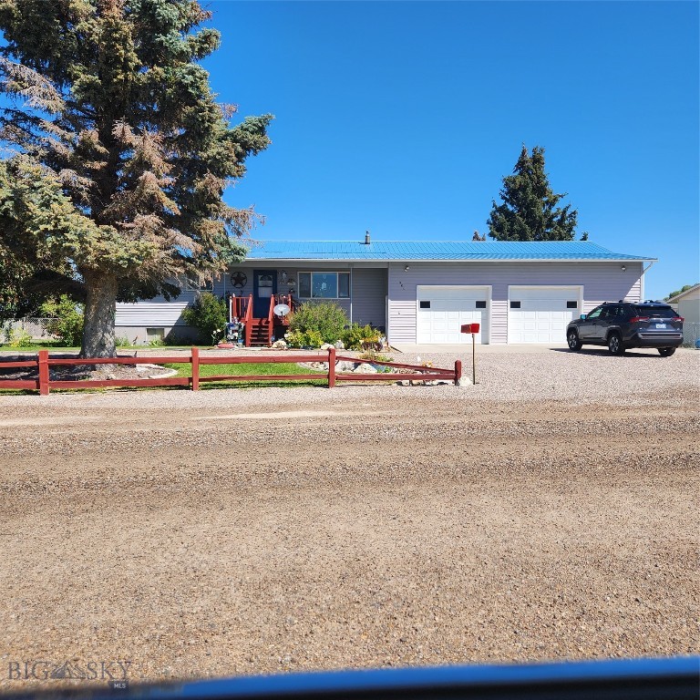 Well kept home on large corner lot with circular drive for easy access in and out. The two car garage is oversized so you have workshop space. The main floor has 1+ 3/4 baths and 3 bedroom. The kitchens has beautiful oak cabinets along with a large pantry closet. A cozy gas fireplace helps keep you comfortable. The basement is about half finished with two multi use rooms. There is plenty of closet space and tons of shelving for food, seasonal items and your treasures. There is a propane tank near the garage that was used for welding. The current owner does not know if this is an owned or rented tank. He doesn't recalling getting a bill for tank rent. The big fenced back yard is beautiful. There is room for onsite parking of tailers or toys. Included are two storage sheds.