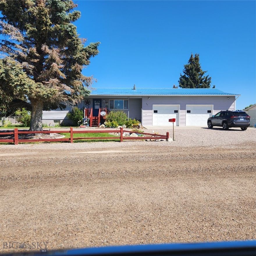 Well kept home on large corner lot with circular drive for easy access in and out.  The two car garage is oversized so you have workshop space.  The main floor has 1+ 3/4 baths and 3 bedroom.  The kitchens has beautiful oak cabinets  along with a large pantry closet.  A cozy gas fireplace helps keep you comfortable.  The basement is about half finished with two multi use rooms.  There is plenty of closet space and tons of shelving for food, seasonal items and your treasures.  There is a propane tank near the garage that was used for welding.  The current owner does not know if this is an owned or rented tank.  He doesn't recalling getting a bill for tank rent.  The big fenced back yard is beautiful.  There is room for onsite parking of tailers or toys.  Included are two storage sheds.