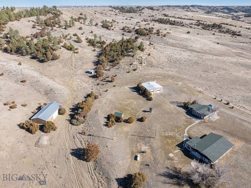 Exceptional opportunity to own 311+ acres in Rosebud County just outside of Forsyth offering privacy, space, and sweeping Montana views. Rolling pastureland with scattered trees, perimeter and interior fencing, and a productive well make this property well suited for livestock, recreation, or a private retreat. The property includes a 1,664 sq ft ranch-style home built in 1980 featuring 2 bedrooms and 1 bathroom. The home was designed with the potential to add an additional level, offering room to expand. Inside you’ll find spacious living areas and a wood stove for comfortable country living. Several outbuildings add functionality including a large shop and garage with power and propane. Three propane tanks and one well service the property. Two tractors, air compressor, lift, and appliances remain. Located just outside Forsyth. Information deemed reliable but not guaranteed. Buyer and buyer’s agent to verify.