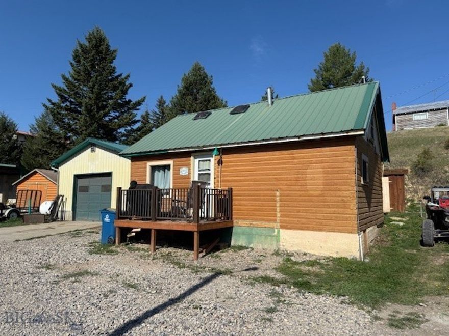 Montana's outdoor recreational mecca! This Checkerboard cabin can be a residence, rental or weekend getaway. Checkerboard Creek is across the street, Bair Reservoir and National Forest are easy drives from the cabin. The quaint 2 bedroom/1 bath cabin is supplemented with a 1 car garage with a shop space and a second floor for storage or company.