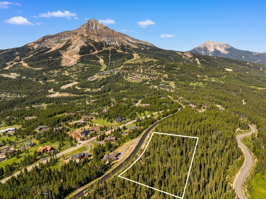 Stop scrolling—this is the best land for sale in the sought-after Cascade neighborhood of Big Sky!  This double lot located on a ridge spans 2.79 acres and checks every box: ski in/out access, unbeatable 360-degree mountain views, and the rare privacy only a parcel this size can offer. Gaze out at iconic Lone Mountain, the dramatic Spanish Peaks, and Andesite Ridge from your future dream home. The ski access leads you to the Big Sky Resort, which has undergone a substantial overhaul of their lift infrastructure to their massive 5,850 skiable acres. Located just minutes from the renowned Beehive Basin trailhead, you'll enjoy world-class hiking right out your door. With Geotechnical soils analysis complete, this land is ready for your home design. Whether you're planning a legacy retreat or the ultimate mountain base camp, this property delivers adventure, seclusion, and jaw-dropping scenery in every direction. Opportunities like this are rare—don't miss it.