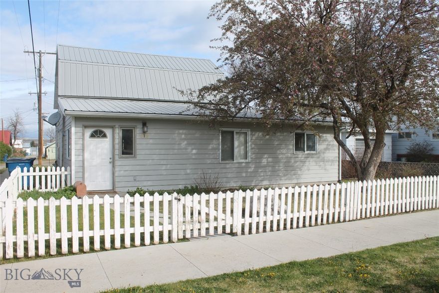 This charming 2,000sq/ft three bedroom and two bath home is conveniently located in the heart of downtown Big Timber. The home features fresh interior paint and updated flooring, providing peace of mind and a touch of modern comfort. This home offers a spacious layout perfect for family, guests, or a home office. The main level includes two bedrooms, a bathroom with tiled walls and a jetted tub, an office or storage room, a laundry room, a living area, and a dining space. Upstairs, you’ll find a roomy master bedroom and a cozy sitting area. The master bath features a ceramic tile floor and a tiled shower with a custom glass door.  With its flexible layout, ample storage, and prime location, this home offers comfort, space, and convenience for a variety of lifestyles. Outside, there’s a handy storage shed, a fully fenced front yard perfect for pets, an underground sprinkler system, and a lovely shade tree. Conveniently close to local shops, dining, and amenities, this move-in ready home blends small-town charm with thoughtful upgrades. Don’t miss the chance to make it yours.