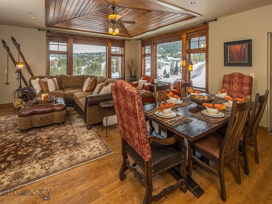 Take in breathtaking Lone Peak views from this stunning 3 bedroom, 3.5 bath Mountain Lake condo.  This mountainside retreat offers luxurious single-level living with high end finishes like custom coffered ceilings, premium cabinets and countertops, new Thermador and Bosch kitchen appliances and 8' solid wood doors.  Offered tastefully furnished for a seamless move-in experience.  Mountain Lake condos are serviced by an elevator for privacy and easy access to the top floor unit.  Step onto the deck and enjoy your morning coffee or cozy up in front of the stone fireplace after the days activities.  This condo boasts direct access via a private stairwell to the amenities: swimming pool, hot tub, fitness and rec room and heated garage for your car and toys.  The complimentary community shuttle service will take you to and from the base area for fast and easy access to skiing!