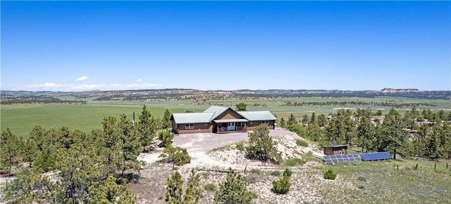 Set on 540± acres of pristine Montana land, this property offers unmatched wildlife habitat and world class opportunities for elk and mule deer hunting. Conveniently located just 45 minutes from Billings International Airport, it provides both ease of access and the serenity of Montana’s great outdoors. The centerpiece of the estate is a classic Montana log home that captures the warmth and charm of a true mountain lodge. Spanning more than 2,864square feet, the home features 4 bedrooms and 4 bathrooms, offering plenty of room for family and guests. At its heart lies the great room, where vaulted pine ceilings and expansive windows fill the space with natural light and frame sweeping panoramic views of the surrounding landscape. Info deemed reliable but not guaranteed. Buyer/buyer agent to verify.