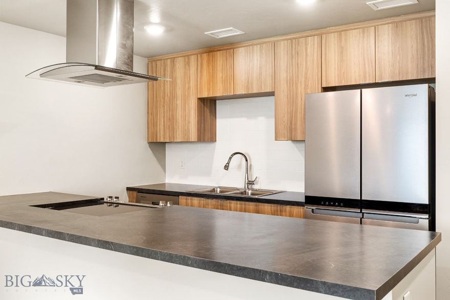 Experience modern living in historic Uptown Butte at Rudolph Condos, Butte's newest condominium development. This 1-bedroom, 1-bathroom condo features an open floor plan and exposed brick. The stylish kitchen boasts stainless steel appliances, while the spacious living area is perfect for entertaining. Located in the heart of Uptown Butte, you’ll enjoy easy access to dining, shopping, and local attractions. Don’t miss this rare opportunity to own a contemporary condo in a vibrant, historic setting!