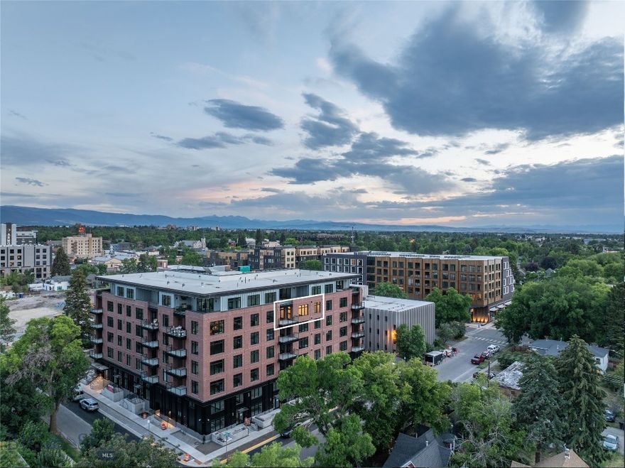 Experience elevated living in this exceptional 2-bedroom + Den, 3-bath residence at The Henry—Bozeman’s premier new downtown address. Spanning 1,635 square feet just one floor below the penthouse, this meticulously upgraded unit offers sweeping Bridger Mountain views and an unmatched level of sophistication.

Nearly every available upgrade has been selected, enhancing the open-concept design with premium finishes and refined details throughout. Large windows flood the space with natural light, while the expansive layout includes a versatile den—perfect for a home office or guest space.

Enjoy rare downtown amenities including underground climate-controlled parking, private storage, a fitness center, and bike room, and private courtyard with a grill and fire pit—all just 3 blocks from Main Street. One of the final upper-level units remaining, this is a rare opportunity to own in the only luxury project of its kind expected in the next several years.