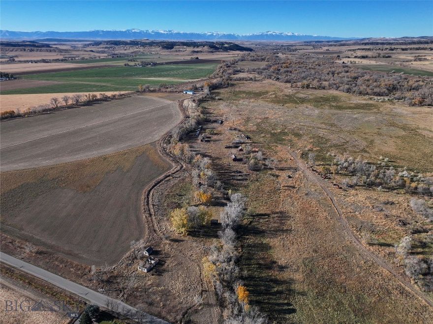 The perfect combination of highly productive farm ground and rich riparian corridor river bottom ground. The 300 acre Rock House Farm has it—a 45 acre pivot of rich farm ground up on the bench and over 220 acre of river bottom ground, of which 90 acres of it is covered by a pivot. 
This farm has both decreed and Rock Creek Water Users Dam shares. 
They have raised both corn and beats on the upper pivot while primarily grazing the river bottom ground. Rock Creek meanders along the entire west and most of the north boundary, with more runs and buckets than a person can fish in a day. 
The owner would  prefer to retain possession of the home and shop of this property. Come take a look at this great farm in the “best last place”.