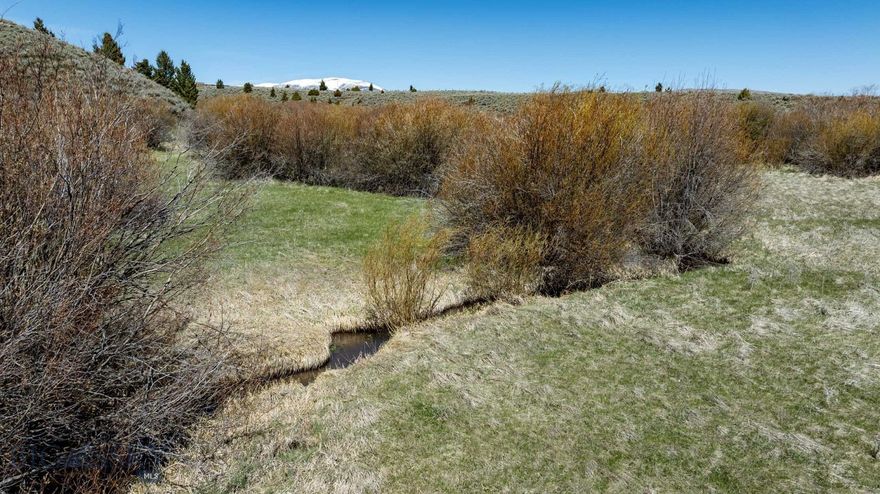 20.1 Acres with Creek Frontage & Stunning Mountain Views! Discover your own slice of Montana paradise, perfectly situated between Helena, Bozeman, and Great Falls. With creek frontage and breathtaking views of the Crazy Mountains, this is the ideal spot to build your dream home and embrace the Montana lifestyle. Located in the Grassy Mountain Subdivision, this growing community features spacious 20-acre lots where owners enjoy wide-open landscapes, incredible vistas, and endless recreation. The area is a haven for outdoor enthusiasts, offering world-class hunting and fishing. Plus, with Showdown and Bridger Bowl Ski Areas less than an hour away, winter adventures are always within reach. For more exploration, the Helena National Forest is just over 2 miles west, providing access to thousands of acres of public land for backcountry adventures. Don’t miss this rare opportunity to own a piece of Big Sky Country!