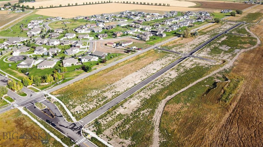 Welcome to Lot 8, Block 2 in Manhattan Meadows, the largest, premier ADU homesite offering the perfect blend of space, scenery, and small-town Montana charm. Set within one of Manhattan’s newest subdivisions, this spacious lot provides the ideal foundation for your custom home—whether you’re dreaming of modern farmhouse, traditional ranch, or a contemporary Montana design. Enjoy wide-open Bridger views and the peaceful setting that Manhattan is known for. With level terrain and convenient utility access, this lot is truly build-ready. Manhattan Meadows offers a thoughtful neighborhood layout, paved roads, and easy access to schools, dining, and the local grocery while still being only minutes from I-90 for quick trips to Bozeman, the airport, or outdoor recreation.