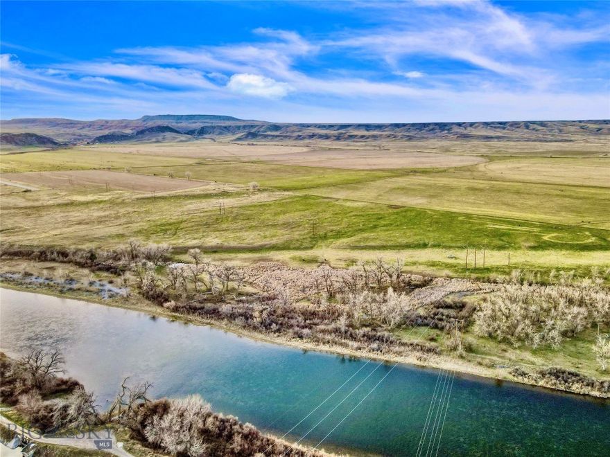 Spanning 2.81 acres, this property boasts around 900 feet of coveted Bighorn River frontage, placing it in a prime location. Known as one of Montana's premier trout streams and among the top in the contiguous United States, the Bighorn River necessitates a Montana fishing license for angling enthusiasts. Immerse yourself in the serenity of this undeveloped area, enveloped by picturesque farmland with Fort Smith visible just across the river. Adjacent to the property lies the Yellowtail Afterbay Reservoir, ensuring a consistent river flow and providing immediate access. Establish a base camp and explore the river by boat from this advantageous site. Consider constructing a cabin as your headquarters for outdoor adventures. Entrepreneurs may find this property ideal for outfitting ventures, catering to outdoor enthusiasts. Embrace a lifestyle characterized by tranquility, fostering a deep connection with nature! Please note that the property does not have legal access at this time and the buyer will need to negotiate an easement with surrounding landowners.