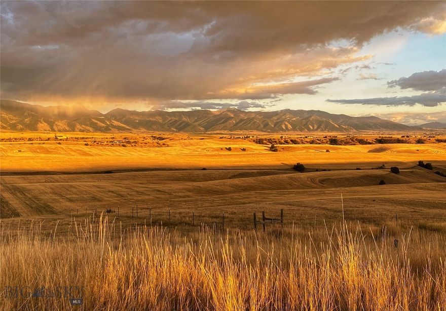 Perched atop a secluded hillside, overlooking Bozeman and the sprawling Gallatin Valley, lies Bridger Views at the Rocking S7—an unparalleled opportunity spanning 20± acres of deeded land with a one-fifth recreational stake in approximately 160± acres, known as the Rocking S7 Sporting Ranch. Among only five available build sites on the ranch, this parcel offers breathtaking panoramic vistas encompassing the Bridger Mountains to the east, the picturesque Gallatin Valley, and the verdant expanse of agricultural land in between. Notably, much of the surrounding Dry Creek area is safeguarded against development through conservation easements, further enhancing the allure of the Rocking S7.

The Rocking S7 Sporting Ranch boasts approximately 1,170± feet of fishable Dry Creek, a perennial tributary of the East Gallatin and a renowned habitat for wild trout from the legendary Missouri River fisheries. Complementing the live water fishery, the ranch features a sizable pond, wildlife food plots, shared recreational amenities, and an agricultural component focused on wheat cultivation by a local farmer. This haven is home to the Montana upland bird trifecta—pheasant, sharp-tailed grouse, and Hungarian partridge—alongside white-tailed deer, mule deer, and occasional elk sightings.

Offering a blank canvas, the 20± acre deeded property presents a designated 1± acre residential building envelope ideal for crafting a main residence, guest home, barn, and additional structures. Revel in the breathtaking spectacle of sunrise and sunset, casting their golden hues across the seven mountain ranges visible from various vantage points on the estate. While the views may evolve with the seasons and weather, their capacity to inspire remains unwavering.