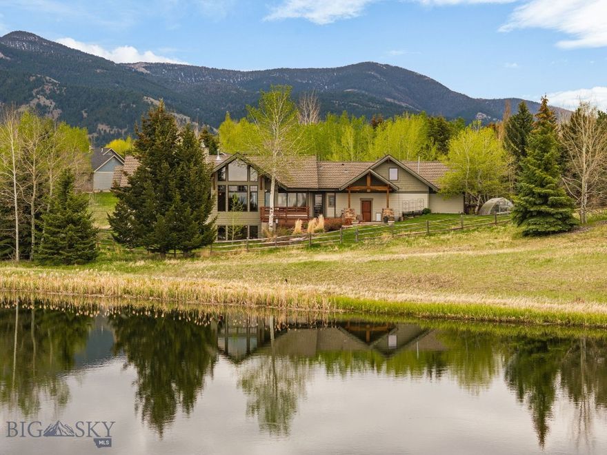 The idyllic Montana setting you have been dreaming of is here, located in the desirable Summer Ridge Subdivision. Designed by renowned architect Jerry Locati and carefully constructed and recently remodeled by the master-craftsmen at SBC, this home captures the essence of the Rocky Mountains in every way. Tucked into a private sanctuary of mature trees and beautiful landscaping on over an acre, with open space on two sides, overlooking a serene pond to the west. Every space perfectly captures the outside environment, with jaw dropping views of the Bridger and Tobacco Root Mountains. Expansive and open main level with vaulted great room feat. tongue & groove ceiling, exposed timbers, and a stacked rock fireplace as the focal point. The kitchen is a chef's dream...with endless work surfaces, 2 prep sinks, regular sink, 2 dishwashers and top of the line Thermador appliances. A 60" 6-burner + griddle range w/ large oven and steam oven and commercial grade exhaust hood, separate third oven, under-counter ice maker, built-in fridge and dual-temp wine-fridge. Extensive storage throughout. Step out onto the spacious deck and patio with built-in firepit  to expand your entertaining and take in the beautiful Bridger sunrises and sunsets across the pond. Take a stroll on the adjacent trail. Main level expansive primary suite w/ its own private deck, fully custom walk-in closet, and spa-like bathroom with soaking tub, tile shower, dual sinks and radiant floor heat. The upper level includes a bedroom, additional living area, 1/2 bath, and 3/4 bath nearby...the perfect place for your guests to unwind in their own private quarters. New two-way motorized window shades throughout main and upper levels. Full daylight basement includes 2 more bedrooms and 3/4 bath, a large game room and living area, with a stacked stone fireplace. Extra-large storage room and under-stair storage. An oversized 3 car garage with extra depth for large vehicles or storage, w/ an adjacent parking pad for campers, boats, etc. For the green thumb in the family, a 20’x10’ greenhouse and storage shed for tools/supplies, and countless beds of flowers w/ built-in drip system. For dog lovers, an underground fence and large kennel in garage. The tranquility of a rural setting, yet just a few miles from downtown Bozeman, Yellowstone International Airport, and the endless recreational opportunities of the Gallatin Valley. Come experience 334 Sky Crest today and imagine making this your new Montana home!