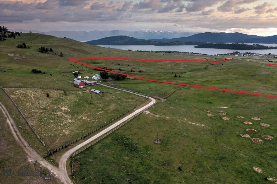 Now available - one of the largest contiguous properties around Flathead Lake. The original 1,367 ± acre ranch has just been expanded with an additional unencumbered 160± acres directly south of the ranch headquarters. This new tract is especially valuable as it carries no conservation easement, covenants or restrictions providing added flexibility for future use. 
 
The new ground offers multiple building sites, subdivision potential, and its own county-maintained road access in addition to access through the main ranch. With natural springs on the property, there is also strong potential for pond and wetland development.
 
Flathead Lake Overlook is a one-of-a-kind 1,367± acre ranch property in Dayton, MT that features the original 1912 home overlooking Cromwell Island on the west side of Flathead Lake. Owned by the Huckins family for decades, the "Huckins Ranch" as it is locally known, has views of the Mission Mountains that provide a scenic backdrop for the modestly updated 1765sf, 4 bed and 1 bath ranch home. 

The property also has a historic barn and multiple outbuildings including a granary that was modified to host 1055 sf, 2 bedrooms and 1 bathroom guest/managers home. The rich history of Flathead Lake Overlook and its proximity to Flathead Lake are just the tip of the iceberg with this property. The south-facing slopes, end of the road privacy, and the half-timbered, half grass pasture provide ample space for your next cattle or horse operation or a significant family retreat.

The ranch has 5 fenced, well-watered pastures. Naturally formed Bow Lake, a 25+/- acre pond and wetlands area up in the timbered portion of the ranch provides a unique alpine water source for multiple species of waterfowl and other birds as well as elk and deer. To the north, the ranch borders thousands of acres of privately timberland creating excellent elk and deer habitat.

Just a mile way in Dayton there is a boat launch and storage facility to enjoy all the recreational pursuits of Flathead Lake. Additional recreation is nearby as Lake Mary Ronan is just a few minutes up the road. Less than one hour to commercial air service in Kalispell and 1.5 hours from Missoula. The quaint town of Lakeside provides dining and recreational opportunities less than 15 minutes from the ranch.

Flathead Lake Overlook itself continues to be offered at $4,500,000, with the option to purchase the ranch together with the additional acreage for a combined price of $5,375,000.
