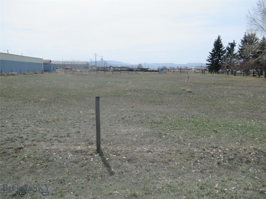 This offering consists of three separate parcels fronting Holmes Avenue to the North and Paxson Avenue to the West.  Located 1/2 block off Harrison Avenue.  The entire parcel contains 4.09 acres. Priced at $12 per sf.