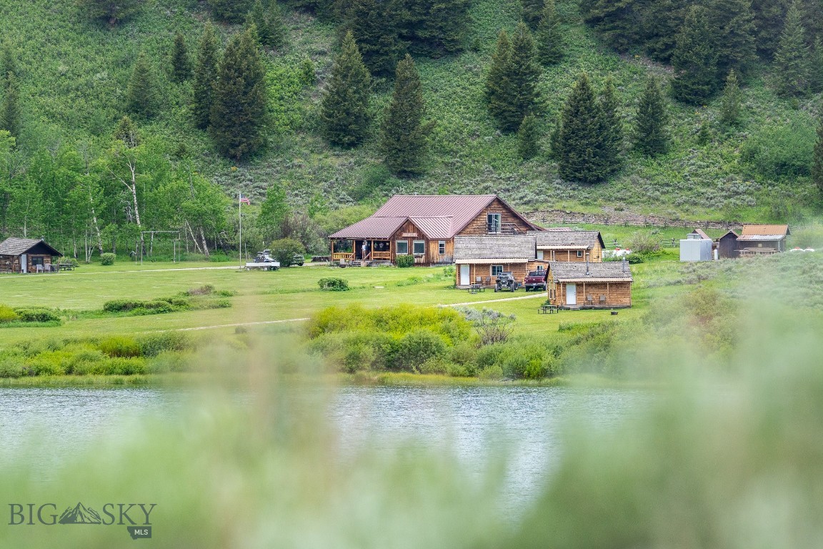 Tucked deep in Montana’s Centennial Valley, Elk Lake Resort presents a rare chance to own a legacy hospitality business in one of the most unspoiled and wildlife-rich settings in the West. Surrounded by sweeping views, endless skies, and abundant big game, the resort’s business, buildings, and infrastructure are now offered for sale—completely turnkey and ready for the next chapter.
Operating seasonally, the resort currently offers all-inclusive lodging, dining, and outdoor recreation to guests seeking the ultimate off-grid experience. The property includes multiple cozy guest cabins, a spacious ranch house, a fully equipped main lodge with a full-service bar, commercial kitchen and dining area, outbuildings, staff quarters, and on-site amenities like a private dock and watercraft for guests. Known for its intimate atmosphere, warm hospitality, and connection to nature, Elk Lake has become a sought-after destination for families, fly-fishermen, wedding parties, and retreat groups looking to unplug and recharge.
That said, the possibilities go well beyond the current business model. With its remote location, strong infrastructure, and access to thousands of acres of public land, this property could easily be transformed into a basecamp for hunting outfitters, a seasonal retreat center, or a private hospitality venture. Whether you want to continue its decades-long tradition of summer lodging and dining, or reimagine it as a destination for sportsmen and backcountry adventure, the foundation is already in place.
This is more than a business—it’s a lifestyle. A place where days are defined by sunrises over the lake, the sound of elk bugling in the fall, and evenings spent under a sky full of stars. If you've been waiting for the right moment to step into a meaningful, Montana-based venture with history and heart—this is it.