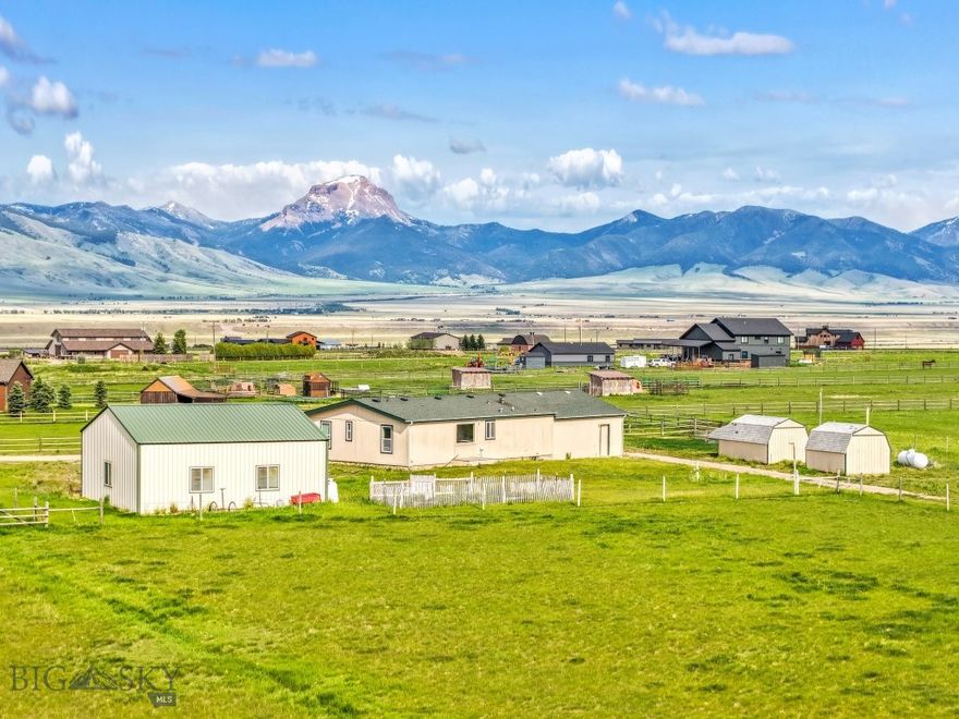 Charming and functional, this 1,144± SF home, including an 1,144± SF unfinished basement, sits on 5± acres and is fully fenced and cross-fenced—perfect for horses or other livestock. Enjoy seasonal irrigation water with current dues paid. This cozy, light-filled 3-bedroom, 2-bath home offers comfortable living in a beautiful rural setting. A 30' x 32' heated shop with propane and a large overhead door provides ample space for vehicles, equipment, or hobby use. Additional structures include two storage sheds (160 SF & 200 SF), a 12' x 24' horse shelter, and a tack room—ready to support your equestrian lifestyle. Separate propane tanks service both the home and the shop for added convenience. Located just 20± minutes from Ennis, where you’ll find groceries, dining, schools, and more. Owners in good standing enjoy access to trout-stocked lakes, and the Varney fishing access site is only a short drive away. Surrounded by public land, the area is a recreational paradise for fishing, riding, hiking, and exploring the outdoors.