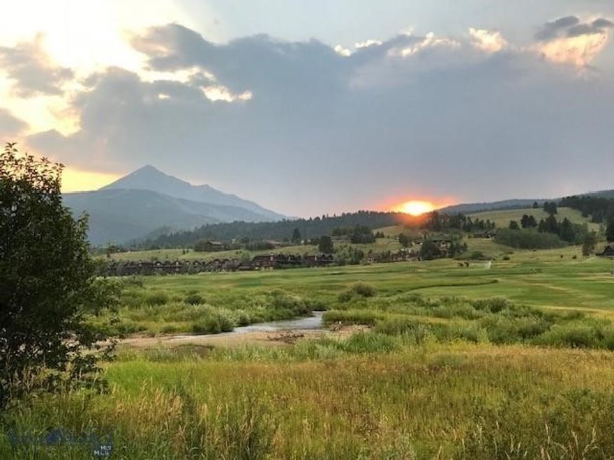 Seller is the 2nd owner since this unit was built in the early 1970's.  Offering spacious views overlooking Silver Bow Pond and Big Sky (public)Golf Course with unobstructed vistas of Lone Peak elevation 11,166' in the Madison Range! One level living with views from every room. Silver Bow Condominiums sit on acres of open space and allow for spacious living within the complex.  A private Homeowners Recreation Building houses the shared Hot Tub, Dry Sauna, Laundry facilities, and NEW outdoor pool. 
Silver Bow #46 has wood composite floors throughout the living space. 3 Bedrooms are carpeted. Bathroom floors tiled. The entire unit has new paint.  Quartz countertops in kitchen and both baths. The layout allows privacy in bedrooms which are located 'down the hall' from the central living area. The open concept Great room includes comfortable seating with cozy wood fireplace, dining area, and upgraded kitchen.  Outdoor dining on enlarged deck, ALL windows face Lone Peak and west facing deck access door is from the Living Room.  SOLD FULLY FURNISHED.  Walk right in, look at the views and ENJOY!!