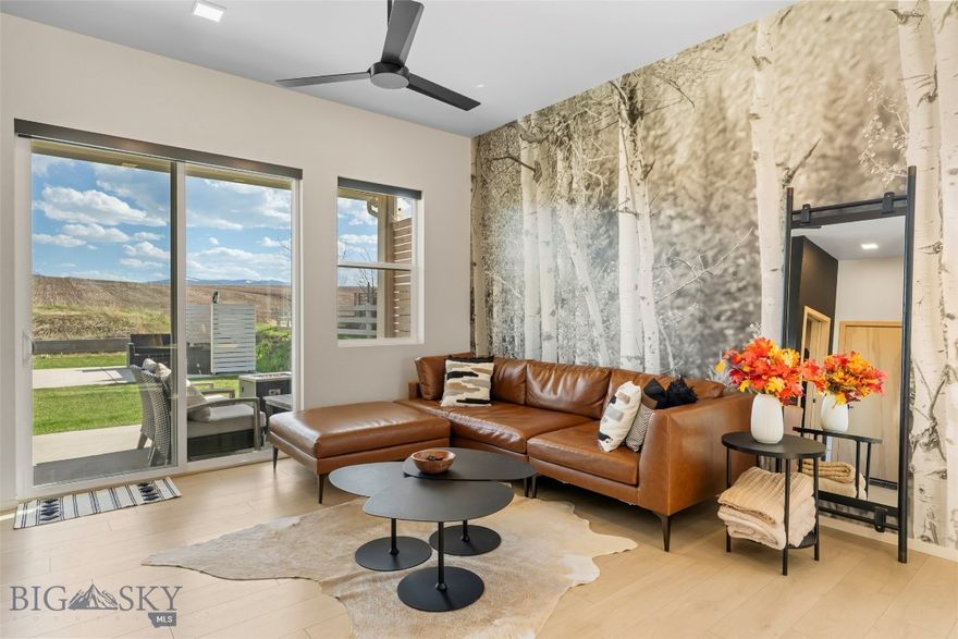 Welcome to modern, low-maintenance living just minutes from Downtown Bozeman. This stand-alone, fully furnished condo offers the privacy of a single-family home with the convenience of true lock-and-leave living—no yardwork, no snow removal, and immediate access to Bozeman’s best amenities.

Thoughtfully designed, this home features two spacious primary suites, each with walk-in closets, tiled showers, and beautiful custom cabinetry. A third versatile room makes the perfect guest bedroom, home office, gym, or flex space. The open layout is bright and inviting, with large windows, mountain views, and seamless flow from the kitchen to the living and dining areas.

Upgraded throughout, you’ll enjoy automatic blinds, Nest thermostats, under-cabinet lighting, built-in speakers, smart-home features, and tasteful, modern finishes that elevate everyday living.

Sip your morning coffee on your private balcony, unwind on one of two patios, and soak in Bozeman’s signature sunsets and wide-open skies. When you’re ready for adventure, simply step outside to the walking and biking trail system—which even converts to cross-country ski trails in the winter.

The oversized garage offers exceptional storage for bikes, skis, and every bit of Montana gear. Located just a mile from downtown, close to the hospital, and surrounded by open space, this home delivers unbeatable walkability, convenience, and lifestyle.

R-O zoning also allows Type 2 short-term rentals (70% owner occupancy), making this an incredible option for primary living, a furnished second home, or a flexible investment property.

A rare combination of location, privacy, furnishings, and modern comfort—this condo checks every box. Come see it in person and experience the ease of Bozeman living at its best.