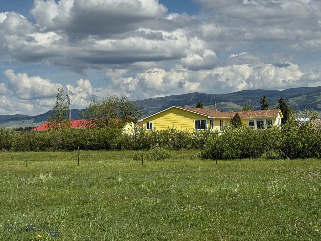 Welcome to a rare opportunity to own a pristine 80-acre irrigated farm and ranch nestled along the tranquil North Fork of the Smith River. This property offers an ideal blend of productive agricultural land, natural beauty, and comfortable country living—perfect for ranching, recreation, or simply enjoying the peace and privacy of Montana’s wide-open spaces. With over half a mile on both sides of the North Fork of the Smith River, there is excellent private small stream fishing for feisty rainbow and brown trout. Located a little over two miles from the community and services of White Sulphur Springs, within 30 minutes of Showdown Ski Area, and just over an hour from the vibrant communities of Bozeman and Livingston, the gateways to Yellowstone National Park.