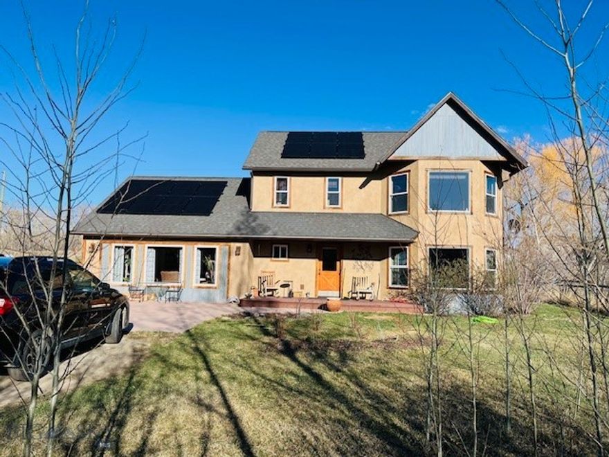 Beautiful 3 Bedroom, 2.5 Bath home featuring a bright and open feel with tons of natural light throughout the home. There is a solar power system plus radiant floor/ceiling heat for of energy efficiency.  There is custom tile and gorgeous cork flooring for ease and comfort. The landscaped yard is thoughtfully maintained with underground sprinklers, colorful perennial flower gardens, mature trees as well as a young aspen grove creating a peaceful outdoor setting. The manicured lawn and garden spaces make it perfect for relaxing and entertaining. There is an additional 3 Lot build site for a quest house or shop/garage or future sale. Located close to local amenities and the scenic Shields River. 29 miles to Bridger Ski Resort, about an hour to Bozeman and less than a half hour to Livingston. Call today for a showing.