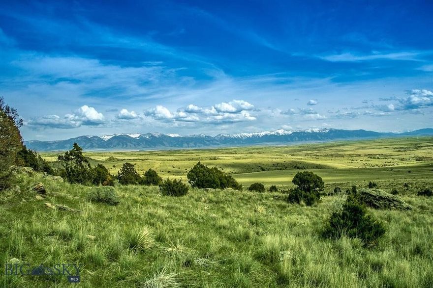 Enjoy breathtaking views with the majestic Spanish Peaks directly ahead, while the Gallatin River winds through the valley below. This expansive 20+ acre parcel offers a stunning panorama featuring seven magnificent mountains. Ideally located near the front of the Ranch with desirable southern exposure and picturesque rock outcroppings. Tucked away at the end of the road, this private hillside property offers a peaceful and serene setting.  The Gallatin River Ranch neighborhood offers private walk-out river access for owners and guests. It's all HOA maintained and park features a covered picnic pavilion, BBQ's and fire pit.  Located 15 minutes outside of the quaint town of Manhattan and only another 15 minutes to Bozeman. Some photos represent GRR Amenities and are not taken from listed parcel. Call your favorite Realtor for a tour today.