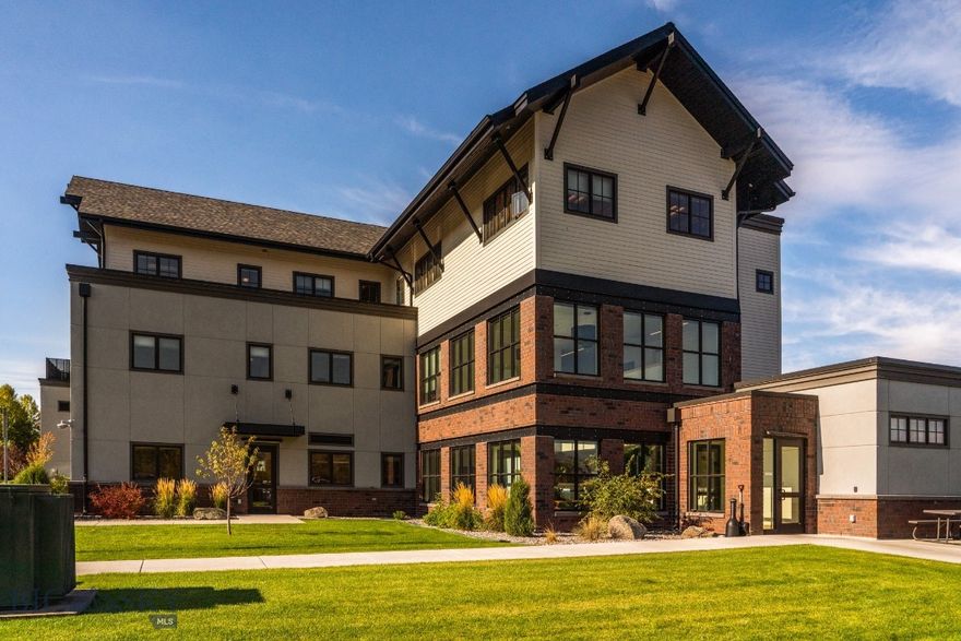 Great opportunity to own an office complex with multiple options.  Large office building could be used for single user or broken down into smaller spaces.  Additional pad site to the north of the existing building allows for further development.  Tucked away in the trees, but close to the Cannery District, downtown, Interstate 90, and walking trails right at the edge of the lot.  Amazing views of open space and the Bridger Mountains, with Bozeman Creek running along the west border of the lot, and access to Story Mill Community Park/Trail to the M.  Original building was built in 1990 and is approximately 26,000 SF.  The addition was built in 2015 and is approximately 38,000 SF.  Buildings are connected with an annex at first and second floors.  Each office has individual climate controls, and there is a 2,500 SF warehouse on site.  Potential for end user ownership, investment opportunity with lease income, or combination of both.