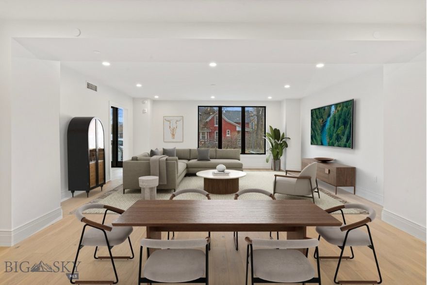 This is an unparalleled opportunity to own Residence #104 at The Henry, a six-story luxury condominium building situated in the heart of Downtown Bozeman. Spanning a generous 2,394 square feet across two levels, this exceptional unit delivers the spaciousness and privacy of a townhome while offering the sought-after amenities of a condominium, including its own private, street-side entrance. The bright and airy interior features meticulous finishes, including sophisticated engineered oak hardwood floors, plush wool carpeting, quartz countertops, and a gourmet kitchen equipped with top-of-the-line Bosch appliances and high-end fixtures. The versatile layout encompasses two bedrooms, a dedicated den, and two and a half bathrooms. The Henry building elevates the residential experience with amenities such as a ground-floor fitness center, a private, beautifully landscaped courtyard, and climate-controlled, secure underground parking. Located just three blocks from the vibrant shops and dining of Main Street, and offering effortless access to world-class recreation, 25 minutes to Bridger Bowl and 45 minutes to Big Sky Resort, this ready-made luxury offering places you perfectly between the stunning natural landscapes of Montana and the energetic core of the Rocky Mountains' coolest town.