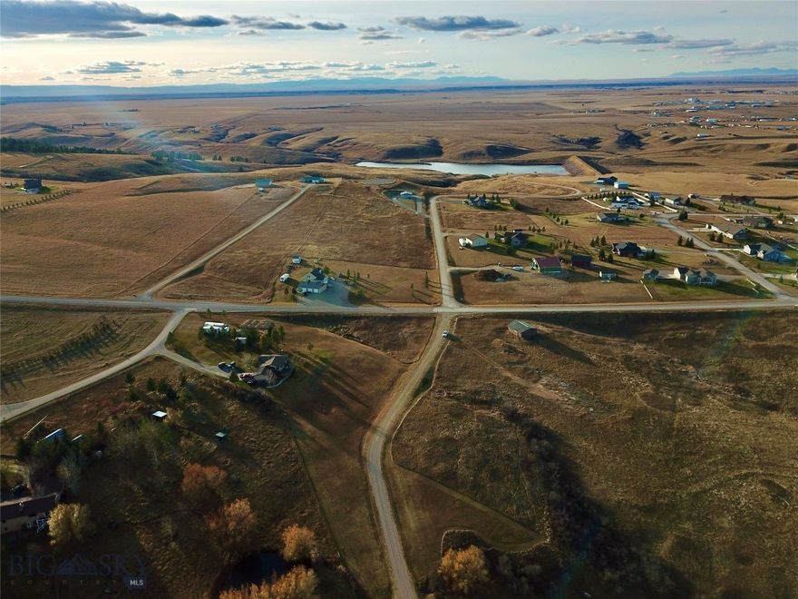 Nestled just two miles south of Lewistown and in the very heart of Montana, this 4.346-acre parcel offers an exceptional opportunity to build a forever home. With paved year-round access, power nearby, and a setting framed by the majestic Judith Mountains, this property captures the essence of upscale rural living—peace, privacy, and panoramic views. The land’s gently sloping terrain provides multiple prime building sites, ideal for a custom home designed to take in the sweeping mountain vistas. Across the road and down the lane mere minutes, the tranquil waters of Big Casino Creek Reservoir invite you to enjoy year-round fishing, kayaking, and quiet reflection, while nearby Snowy and Little Belt Mountains offer unmatched opportunities for recreation—hiking, horseback riding, skiing, and hunting in some of Montana’s most scenic terrain. Love mountains scenery and adventuring? This area is surrounded by 5 different mountain ranges so point your compass in any direction for an unforgettable experience! Without the restrictions of an HOA and guided only by minimal covenants, owners enjoy the freedom to craft a residence or retreat that complements the landscape while preserving the area’s enduring charm and quality. Just minutes away, Lewistown stands as one of Montana’s most inviting communities—an authentic small town with modern amenities, boutique shops, fine dining, medical facilities, and a regional airport. Don’t let an opportunity like this one pass you by!