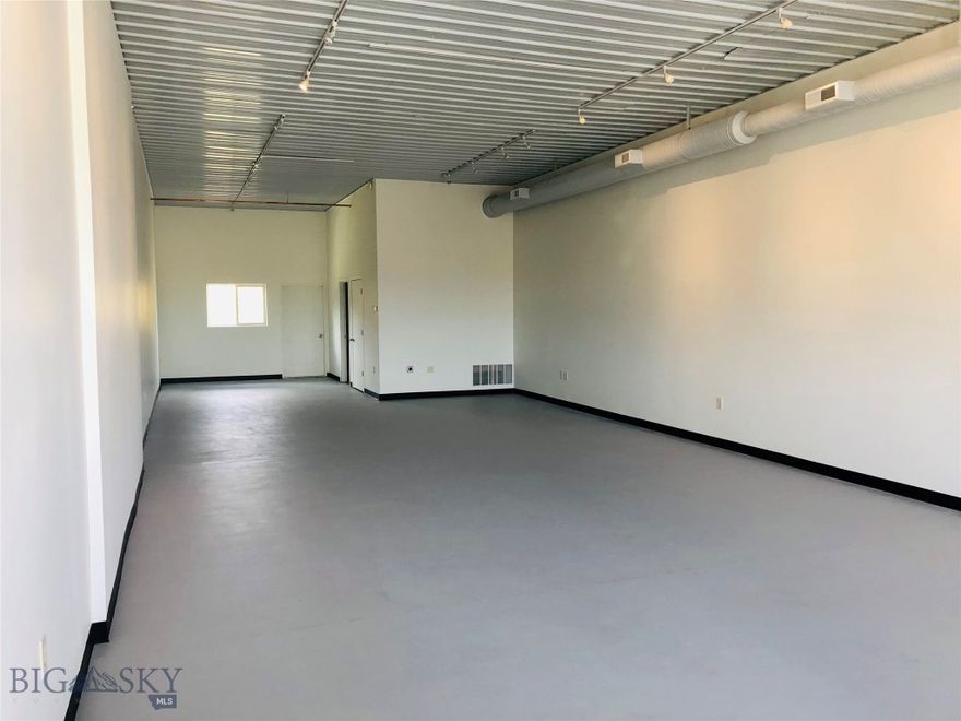 1200 Sq Ft Retail, Office, Service unit for lease. Perfect for retail, service, office, you name it! This unit has storefront windows, great visibility along Gallatin Rd, a small overhead door in the back, and huge potential. Approximately 18k cars a day, so this is a perfect location to capture all the Big Sky Canyon Traffic. The adjacent unit (MLS #407219) is available, possibility to open both units for 2,400 sq ft of space. $1,915/month + Utilities (gas, electric, data). No Cannabis.