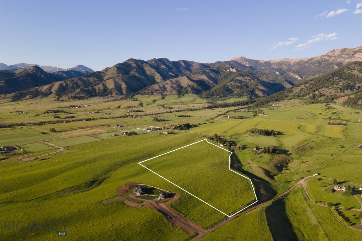 Welcome to 687 Glory Lane — a truly exceptional 20-acre estate opportunity nestled just off Sypes Canyon Road, where the Montana landscape opens wide and the views stretch endlessly. This pristine parcel offers sweeping, unobstructed vistas of the Bridger Mountains, Tobacco Roots, and Spanish Peaks, delivering a front-row seat to some of the region’s most iconic scenery.
This pristine land is part of Middle Cottonwood Zoning, and surrounded by an abundance of natural beauty. The land features a striking mix of gently rolling hills and level ground — the perfect canvas for a bespoke residence, private guest quarters, and an elegant barn or shop. With entitlements for one single-family home, one additional dwelling unit, and one shop or barn, this is an extraordinary opportunity to design a luxury retreat without compromise.
Enjoy the ultimate blend of seclusion and access: only 15 minutes to Bozeman Yellowstone International Airport and also only 15 minutes to the heart of downtown Bozeman. Here, luxury means waking up to sunrise over the Bridgers, entertaining beneath the wide western sky, and living immersed in nature, with every modern convenience just minutes away.
There are few places where land, location, and limitless potential come together so seamlessly.
Build your Montana legacy at 687 Glory Lane.
Please ask your favorite real estate professional for additional information on the Already approved septic, possible house plans and more.
