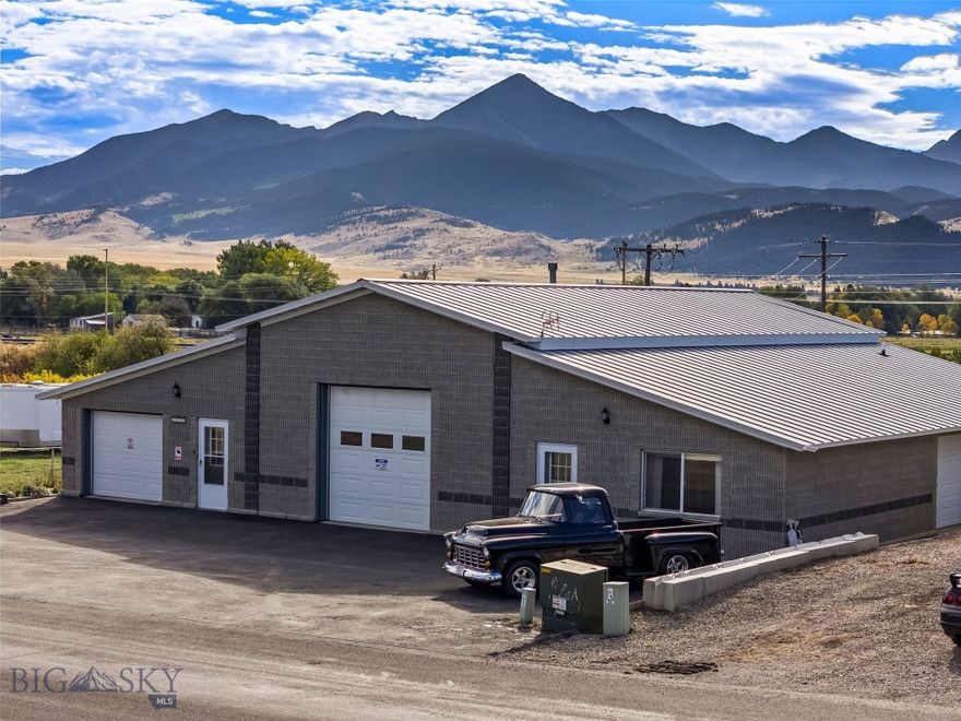 Set on three commercial lots totalling .75+/- acres just minutes from downtown Livingston, 1801 Sun Ave offers versatility and elbow room with a layout designed for living, working, and creating. This unique 3,456± sq ft structure combines a well-maintained main residence, an attached studio-style ADU with a private entrance, and a heated shop with a 12’ electric door and vehicle lift (negotiable)—ideal for car enthusiasts, woodworkers, or anyone needing space to build and store. Each living unit has its own garage, ensuring you won’t have to take up shop space for vehicle storage. The main home includes two spacious bedrooms—one on each end of the home with their own en suite bathrooms— tall ceilings, abundant natural light, and thoughtful updates including new landscaping with privacy fencing and freshly sealcoated paved parking, with plenty of room for your vehicles, toys, or business traffic. The attached ADU features its own entrance, a ¾ bath, and a flexible studio layout with laminate and carpet flooring. Highly insulated with zip panel and concrete construction, this property is energy efficient and built to last. Outside, the yard is fenced and includes raised garden beds, and room to expand. The property borders additional lots (included in the sale) that offer increased privacy and development potential. The East side of the property is edged by Fleshman Creek, and mature apple trees line the western boundary.
With unobstructed views of the Absaroka Mountain Range, and space for projects, guests, or business expansion, this is a rare opportunity in Livingston for those who value function, freedom, and flexibility. Commercial Listing: 406291, Home w/ Apartment Listing: 406294